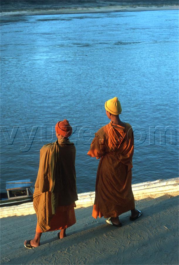 Buddhist monks by the Mekong / Location: Luang Prabang, Laos