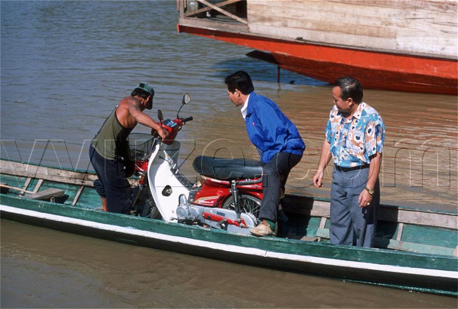 Honda on  the ferry / Location: Laos