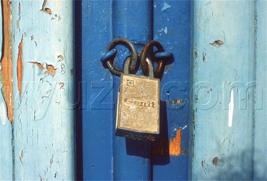 Lock on blue painted door / Location: Greece