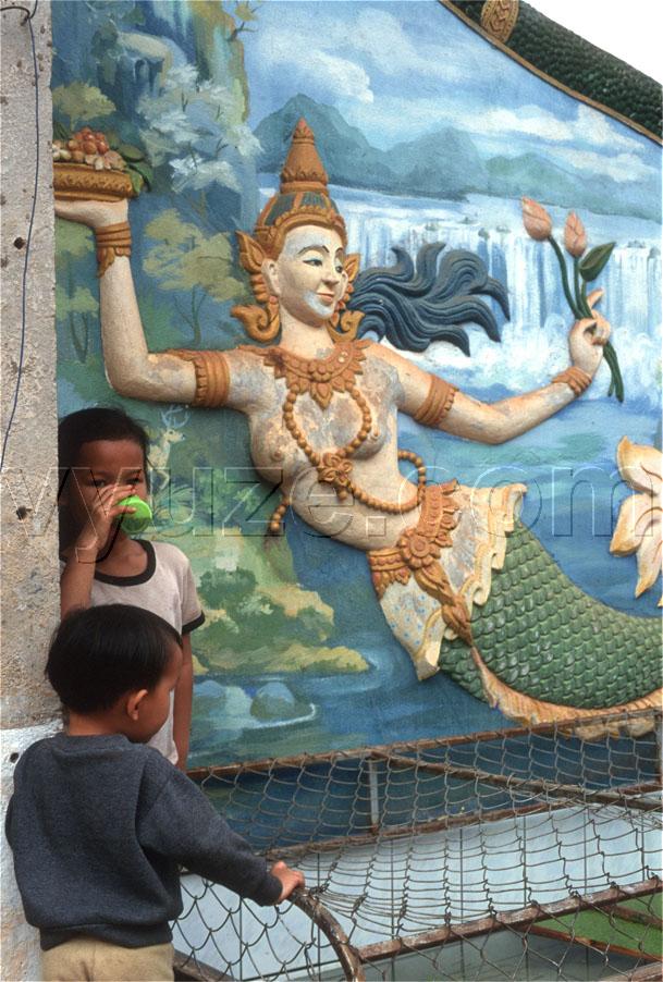 Mermaid on temple wall / Location: Vientiane, Laos