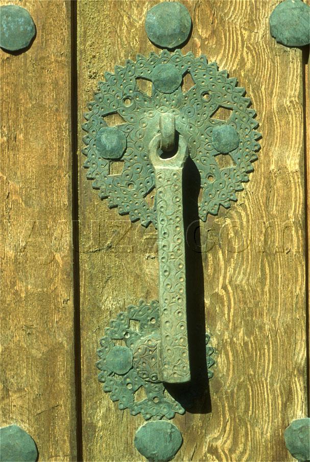 Metal fittings on wooden door / Location: Greece
